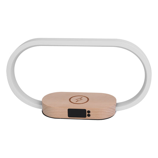 Wireless charging bedside lamp showing digital clock display with time and date