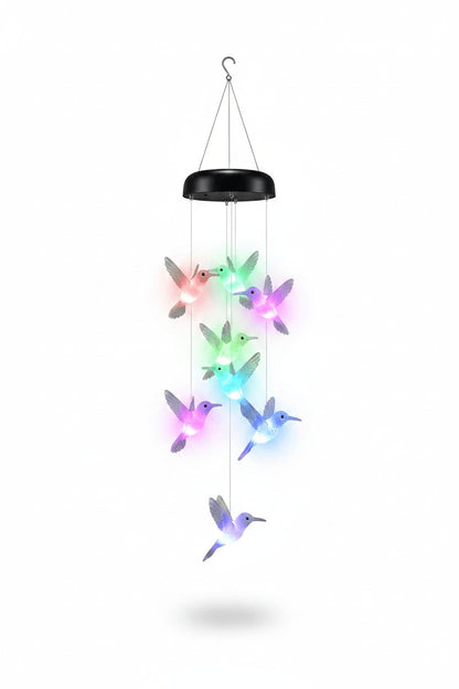 Solar hummingbird wind chime light single unit on white studio background