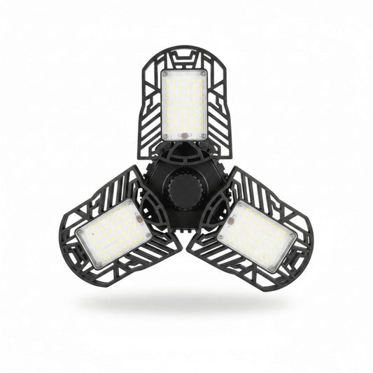 Deformable LED garage light with tri-blade panel on white studio background