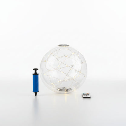 Inflatable solar pool light globe on white studio background with LED glow